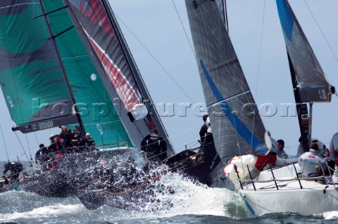 Emirates Team New Zealand rounding the bottom mark between Quantum Racing USA and Synergy RUS Race f