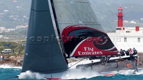Emirates Team New Zealand pounds to windward mark three in the coastal race of the Trophy of Portuga