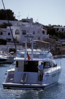 Fairline Powerboat entering harbour in the Mediterranean