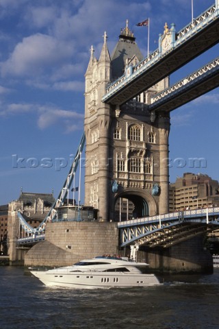 Fairline Squadron 74 under Tower Bridge on the river Thames in London