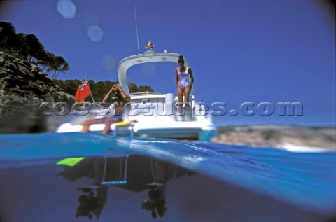 Fairline powerboat  cruising above and below