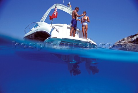 Fairline powerboat  cruising above and below