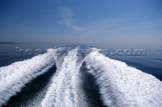 The wake from a Fairline power boat at full speed