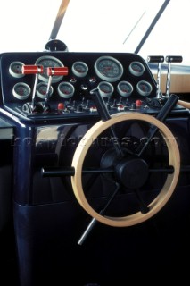 Wheel, dials and controls on a modern powerboat