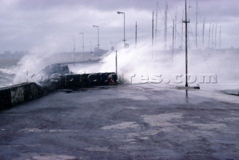 Storm waves crashing over breakwater in Punta del Este Uraguay