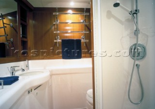 Luxury interior bathroom and shower room of a Swan 80 maxi yacht