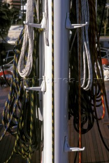 Detail of lines and halyards hanging from mast