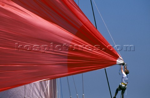 Bowman prepares to release spinnaker before a sail change