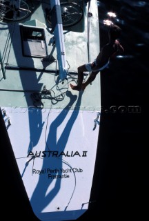 Crew member standing on stern of Americas Cup yacht Australia II