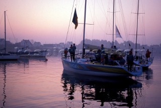 The crew of Oracle return from on offshore race - Admirals Cup 1991