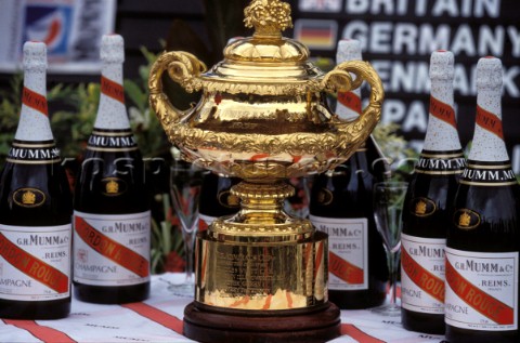 The Admirals Cup  surrounded by bottles of Champagne Mumm
