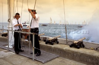 Race Officers signal the start of a race on the platform of the Royal Yacht Squadron, Cowes, Isle of Wight