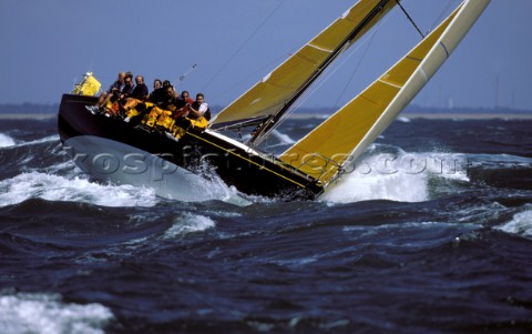 Farr 40 Dignity crashing through rough seas in strong winds  Commodores Cup 2000