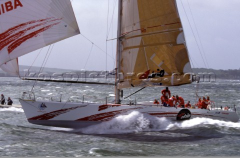 Whitbread 60 Tokio blasts along on the plane under spinnaker at the finish of the Whitbread Round th