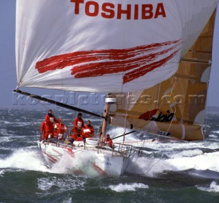 Whitbread 60 Tokio blasts along on the plane under spinnaker at the finish of the Whitbread Round the World Race 1993/1994