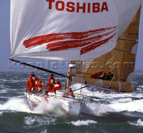 Whitbread 60 Tokio blasts along on the plane under spinnaker at the finish of the Whitbread Round th