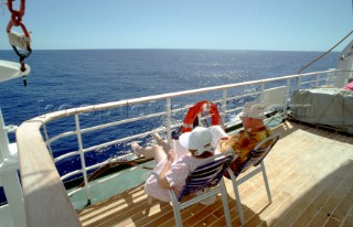 Passengers relaxing on QE2