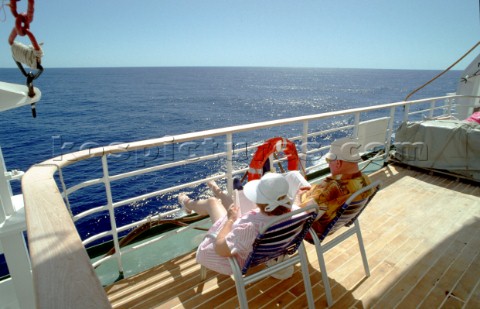 Passengers relaxing on QE2