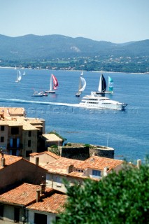 Yachts under spinnaker in the bay of Saint Tropez, France