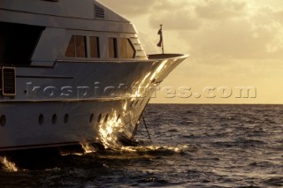 Sun reflection on bow of motoryacht
