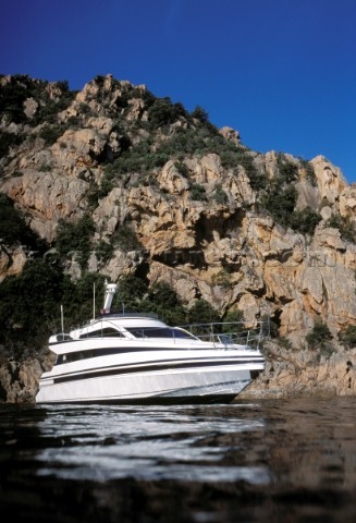Conam 48 powerboat at anchor moored in Corsica