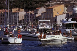 Power boats manoeuvring in the busy harbour of Calvi, northern Corsica