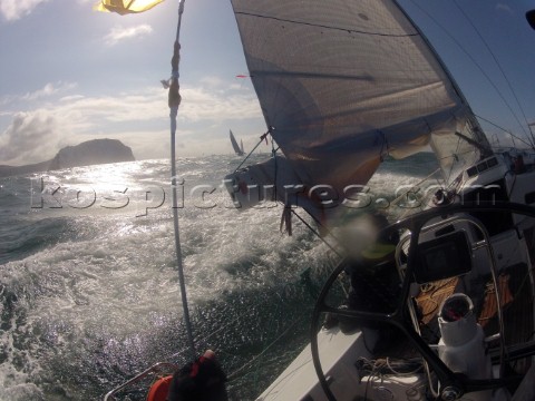 Helmsman driving upwind in rough seas onboard the Norwegian J133 Madjus during the JP Morgan Round t