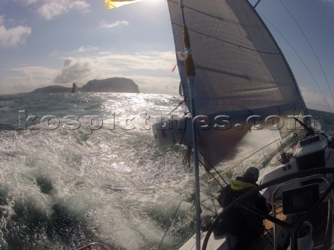 Helmsman driving upwind in rough seas onboard the Norwegian J133 Madjus during the JP Morgan Round t