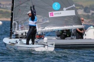 WEYMOUTH, ENGLAND - AUGUST 5th: Ben Ainslie of Great Britain wins Gold Medal in the Mens Finn sailing dinghy class at the London 2012 Olympic Games at Weymouth Harbour on August 5th, 2012 in Weymouth, England. (©Kos Picture Source/Getty Images)