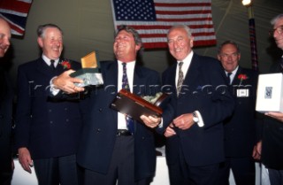 The Atlantic Challenge Cup 1997 presented by Rolex. Organised jointly by the New York Yacht Club and the Royal Yacht Squadron this superyacht race started from Ambrose Light (New York) and finished off The Lizard, Cornwall, UK. Steve Carson skipper of Adela receives the Rolex Chronometer from John Hunt, the General Manager of Rolex