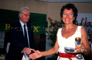 Mrs Bonedeo of yacht Rose Salavvy receives a trophy from Paul Stuber of Rolex Geneva. Maxi Yacht Rolex Cup 1995. Porto Cervo, Sardinia.