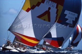 Line of colourful spinnakers