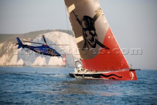 PORTSMOUTH, UNITED KINGDOM - JUNE 2:  Pirates of the Caribean lost her lead after the start and was fourth boat to pass The Needles on their way to Rotterdam in light winds. A press heliopter flies in to get a good shot. The Volvo fleet leave Portsmouth and sail through the Solent on Leg 8 of the Volvo Ocean Race 2005-2006 around the United Kingdom to Rotterdam, Holland. The overall event has already been won by Mike Sanderson on ABN AMRO ONE with two legs remaining.
