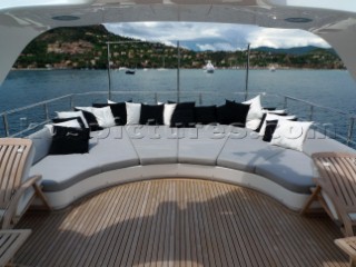 Superyacht in the Mediterranean. Cushions and sunbathing area.