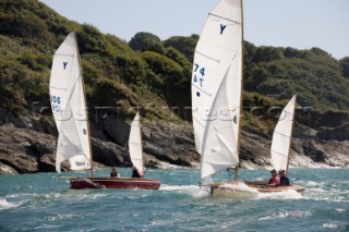 Salcombe Yawls planning and surfing downwind during racing at the Salcombe Regatta Week 2011, Devon, UK