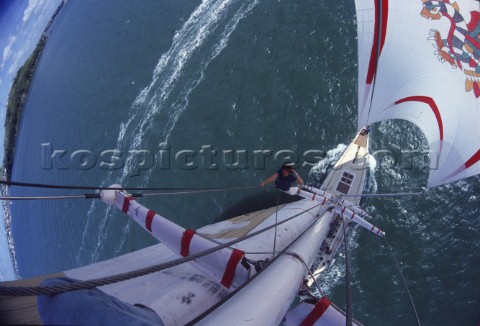 Simon Le Bon of Duran Duran up the mast of his maxi yacht Drum at the start of the Whitbread Round t