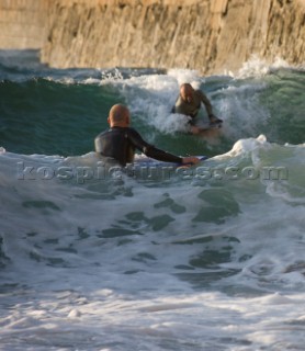 Body Boarding in the surf on the beach in St Ives in Cornwall, UK.