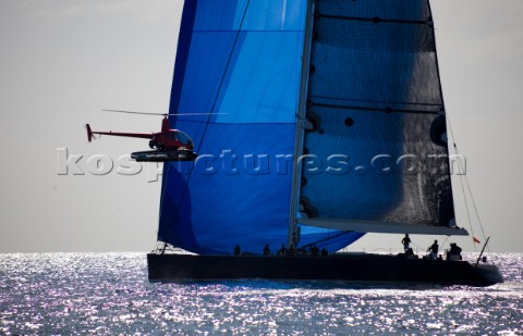SAINTTROPEZ FRANCE  A press helicopter hovers close to the Wally maxi yacht Magic Carpet 3 owned by 