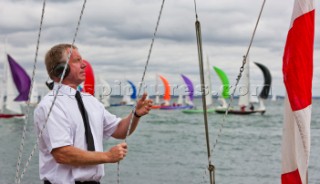 Peter starting races with flags and signals at the Royal Yacht Squadron - Rolex Fastnet Race 2011