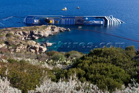 The passenger cruise ship Costa Concordia hit rocks and ran aground at 945pm on the Island of Giglio