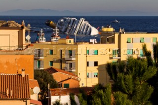 The passenger cruise ship Costa Concordia hit rocks and ran aground at 9.45pm on the Island of Giglio on January 13th 2012. The wrecked ship lays on a reef heeled on its side.