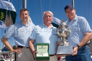 Hobart, 30-12-2006  Rolex Sydney Hobart 2006  Richard de Leiser, Rolex SA and CYCA Commodore Geoff Lavis presents a Rolex Yachtmaster and the Tattersalls Cup to LOVE & WAR  skipper, Lindsay May