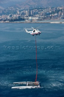Russian helicopter lifts and transfers the multihull catamaran Alinghi 5 from Lake Geneva to Genoa on the Mediterranean