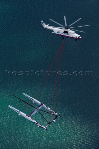 Russian helicopter lifts and transfers the multihull catamaran Alinghi 5 from Lake Geneva to Genoa o
