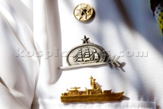 Pins badges and awards or merit on a sailors uniform  The Tall Ships Races 2007 Mediterranea in Genova. Guayas (Ecuador)