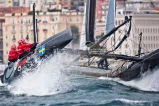 Naples (Italy), 11/04/2012  Americas Cup World Series Naples 2012  Artemis Racing leaps from a wave on Day 1
