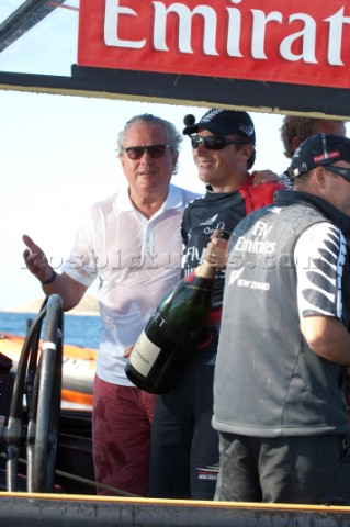 Bruno Trouble and Emirates Team New Zealand helmsman Dean Barker after the teams 3  2 win over Syner
