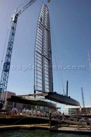 Oracle Racing rig and float the first AC45 in Auckland 1612011 The wing sail mast is stepped with a 