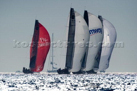 Emirates Team New Zealand sails the final leg to a second placing behind Team Origin GBR in race two