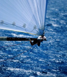 Bowman dangles off the spinnaker pole